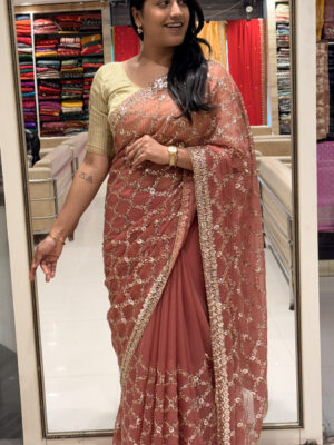 elegant rose gold net embroidered saree with designer blouse