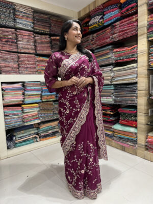 elegant wine embroidered saree with designer border