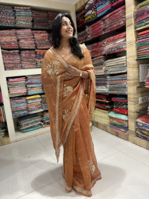 elegant hand embroidered organza saree – rust orange