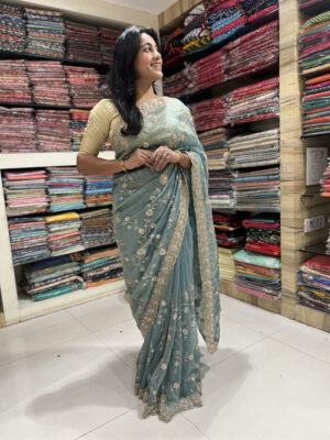 elegant embroidered organza saree – dusty teal green