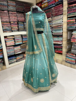 elegant teal green embroidered lehenga set with designer dupatta
